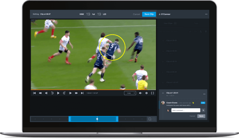 Rugby match video analysis on laptop